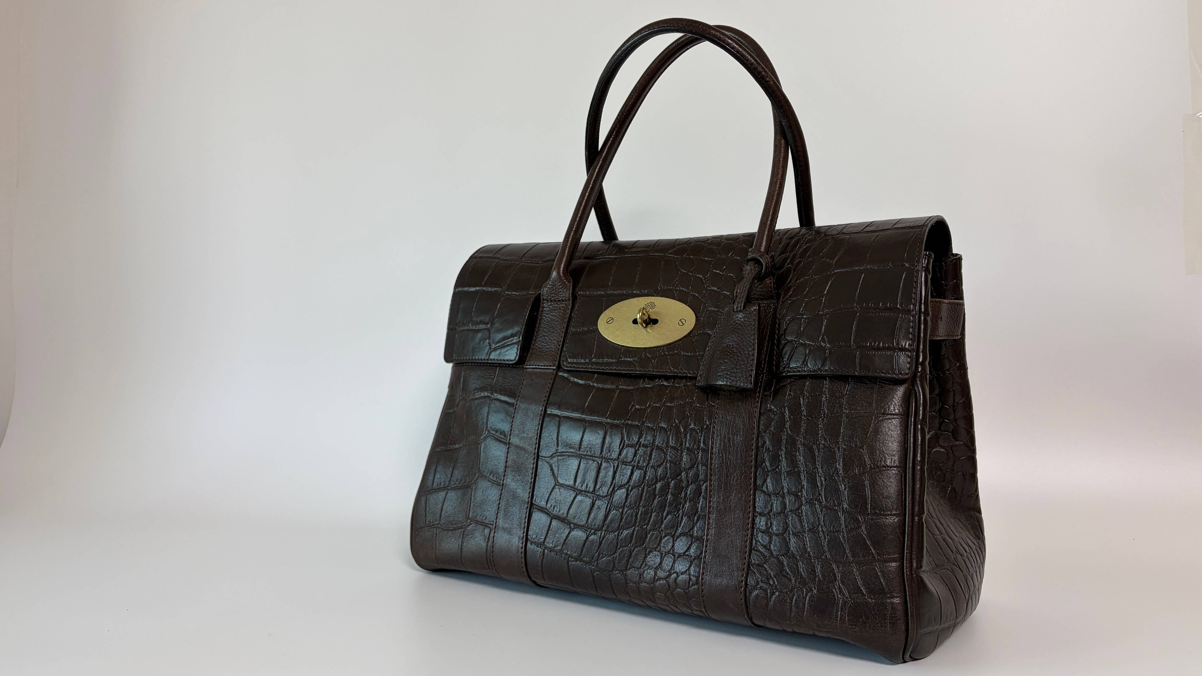 Mulberry Bayswater Dark Brown leather handbag with crocodile pattern on a white background