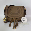 Authentic Chloé Marcie Medium Crossbody Bag Nut brown leather front view with tassel details