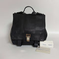 Authentic Proenza Schouler PS1 Backpack black leather front view with silver-tone clasp