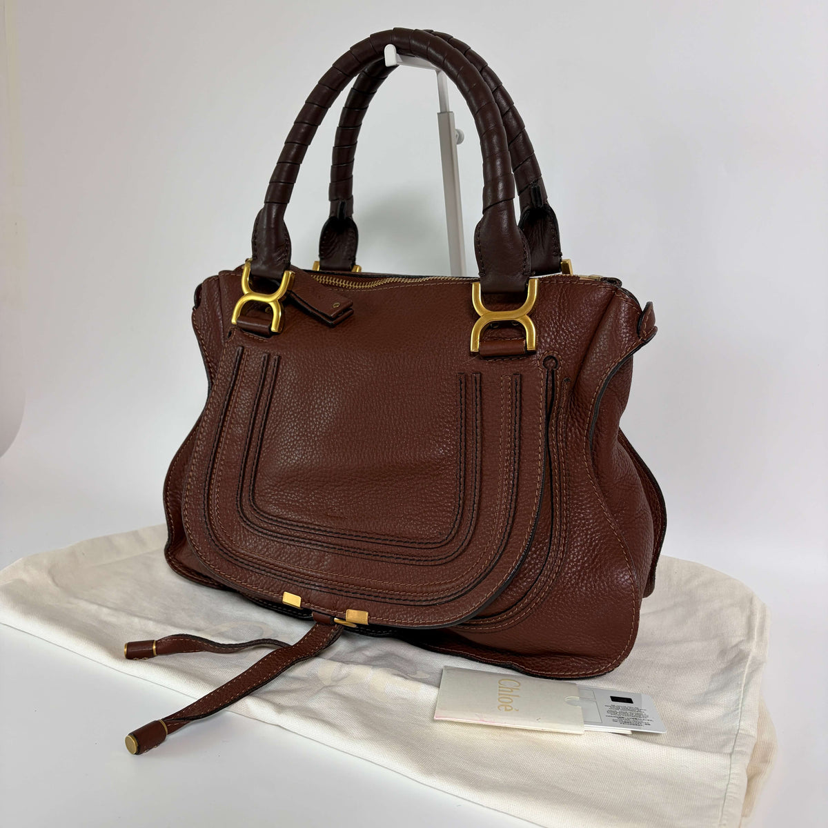 Authentic Chloé Marcie Shoulder Bag brown leather side view with signature stitching and gold-tone hardware