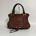 Authentic Chloé Marcie Shoulder Bag brown leather front view with signature curved stitching