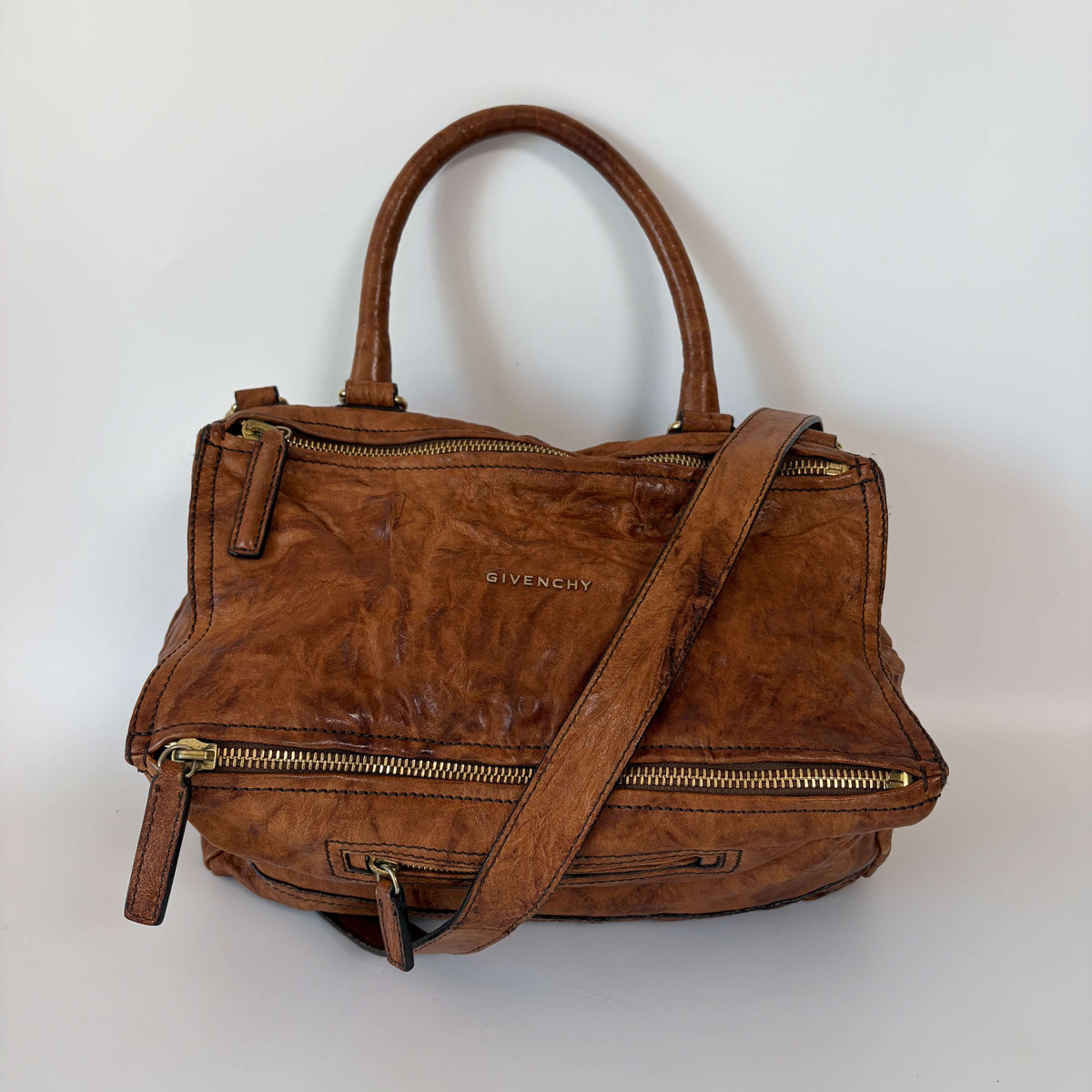 Authentic Givenchy Pandora Medium Shoulder Bag brown distressed leather front view with Givenchy logo and zip compartments