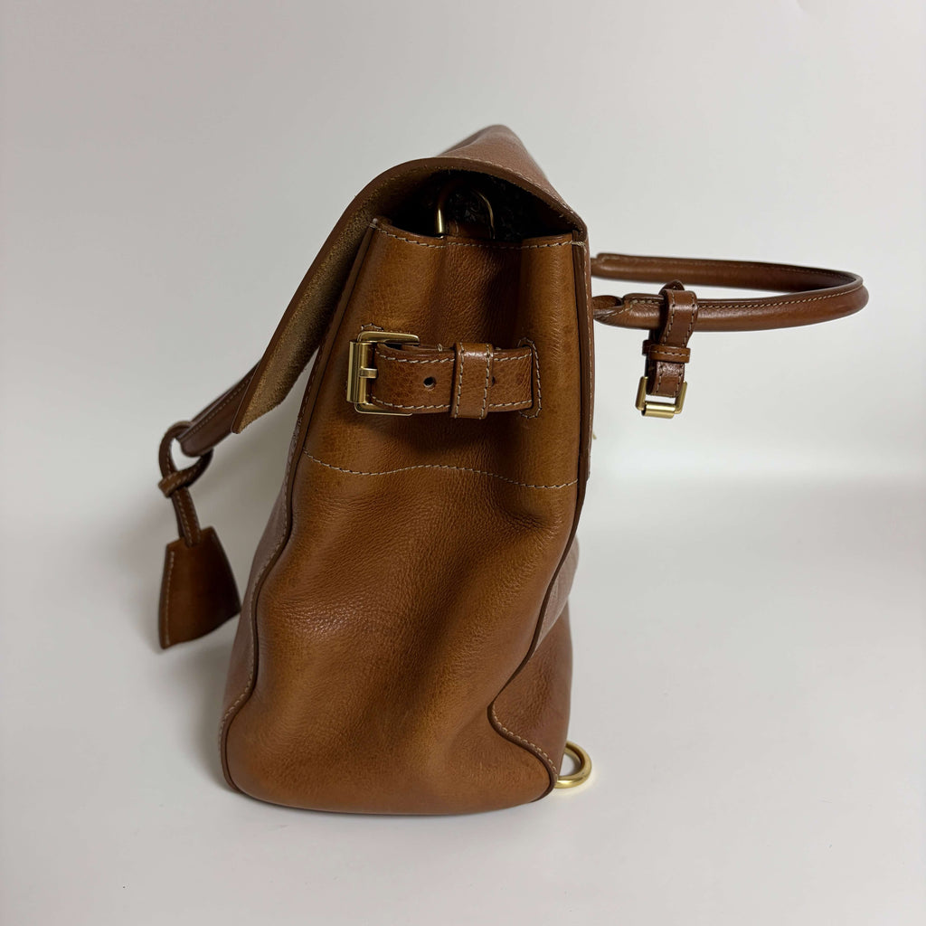 Mulberry Cara Delevingne Backpack Oak leather right side view with strap attachment hardware