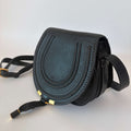 Authentic Chloé Marcie Mini Crossbody Bag black leather side view with signature curved stitching