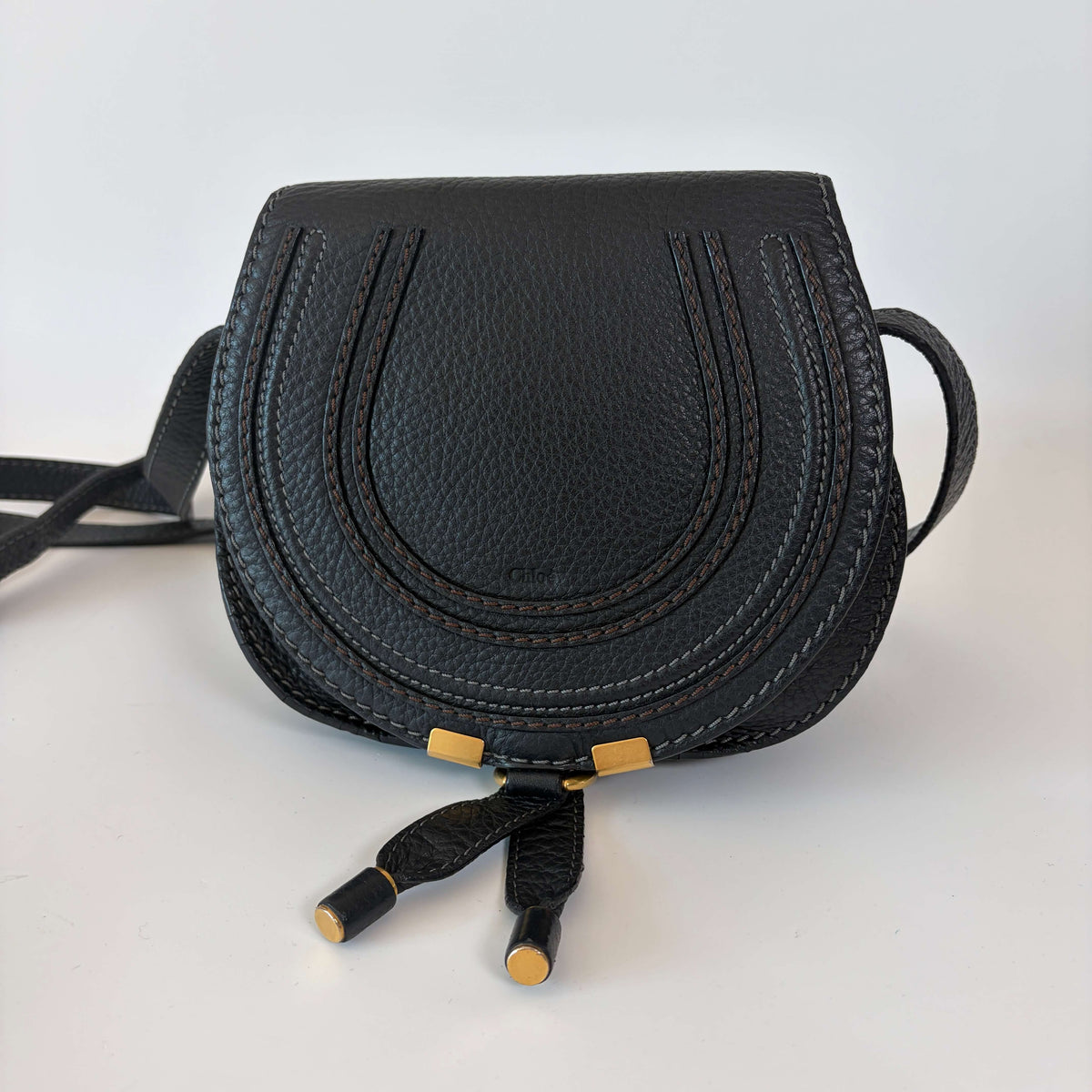 Authentic Chloé Marcie Mini Crossbody Bag black leather front view with tassel details